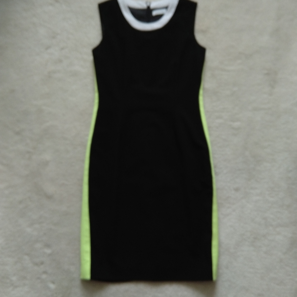 Calvin Klein neon green and black bodycon dress.